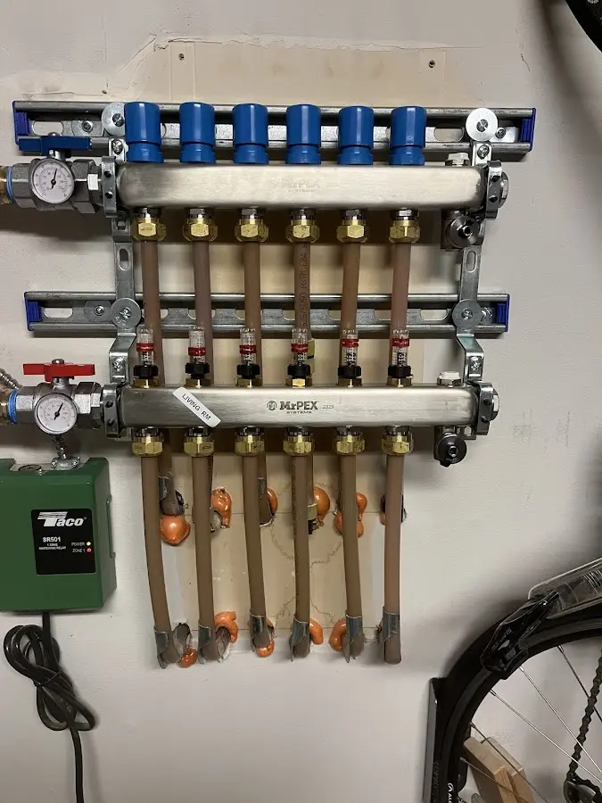 Plumber performing Water Heater Repair at a residential property in Darby